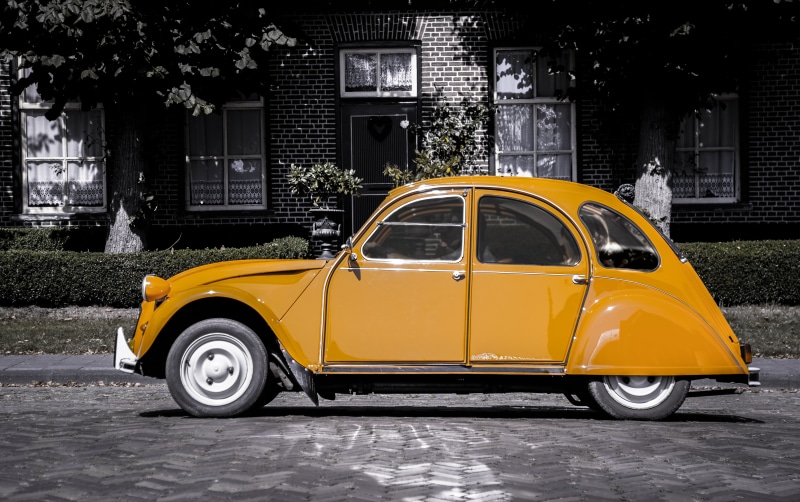 street, urban Scene, architecture, built structure, taxi, old-fashioned, city, 2cv, color, outdoors, coupe, vintage, orange, automobile, car, beetle, garage