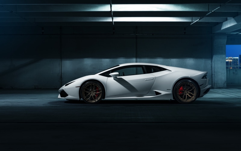 sports car, motor vehicle, built structure, 2K, wealth, Lamborghini Huracan LP 610-4, indoors, parking garage, white color, modern, no people, white, stationary
