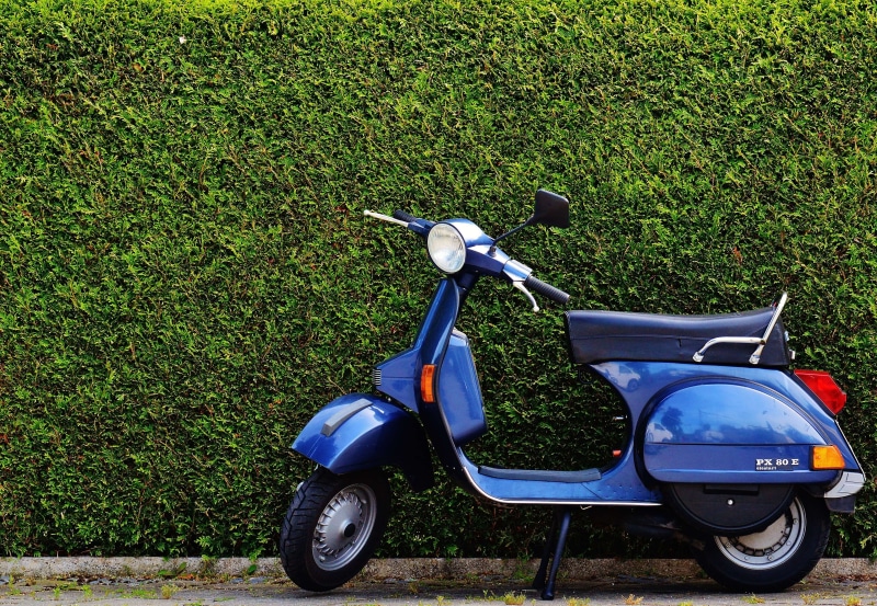 vehicle, pavement, retro, parking, motor, transportation system, nature, field, grass, green color, mode of transportation, motor scooter, plant, scooter