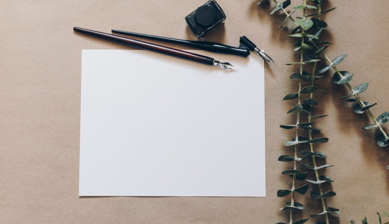 letter, table, nib, stationery, book, note pad, black, high angle view, copy space, wood - material, pen, indoors, blank, printer, vines, no people, sheet
