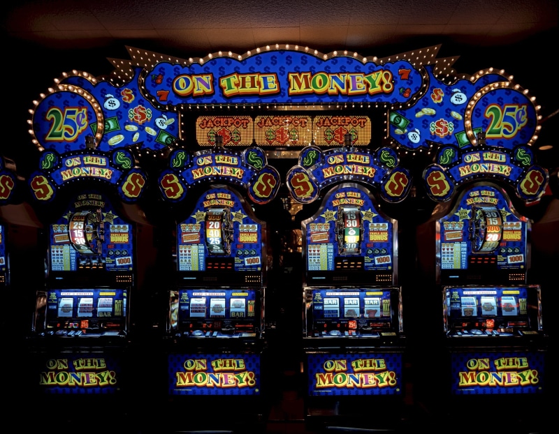 built structure, religion, jackpot, las vegas, text, money, indoors, slot, window, pattern, game, risk, no people, chance, leisure, luck, machine, design