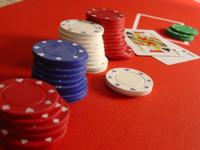 large group of objects, close-up, stack, high angle view, poker, gaming, variation, chips, cards, multi colored, casino, indoors, game, red, 2K, bet, relaxation