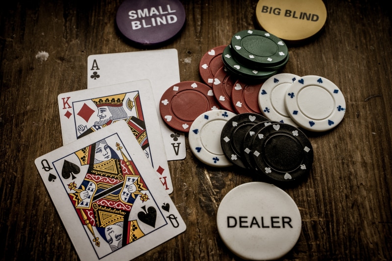 large group of objects, game chips, text, poker, card game, casino, game of chance, cards, play, still life, profit, opportunity, variation, leisure games
