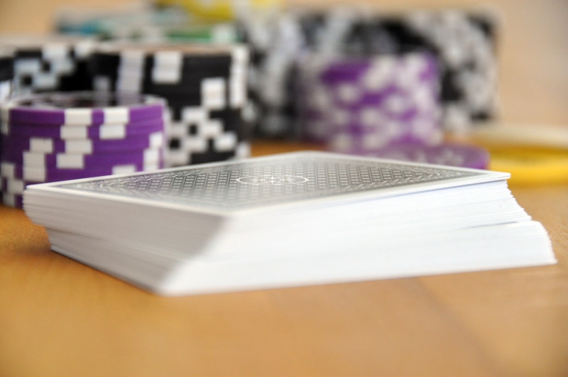 box - container, wireless technology, furniture, box, poker, absence, large group of objects, close-up, no people, focus on foreground, technology, card game