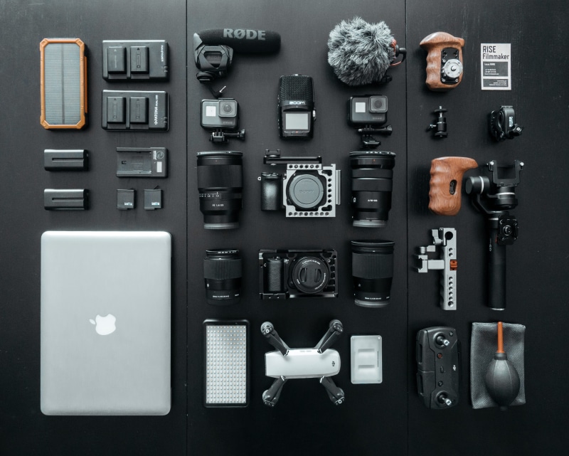 still life, camera - photographic equipment, parts, large group of objects, silver, table, flatlay, arrangement, digital camera, equipment, laptop, filmmaker