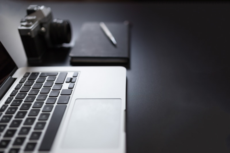 black background, table, 5K, photography, desk, indoors, devices, furniture, pro, keyboard, internet, beside, laptop, grey, wireless technology, creative