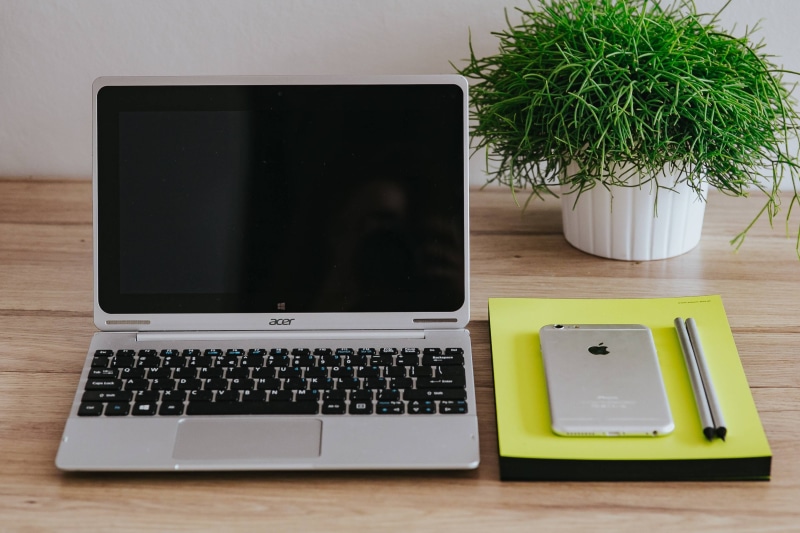 business, Acer, work, technology, indoors, communication, notebook, computer Keyboard, green color, connection, still life, keyboard, office, wood - material