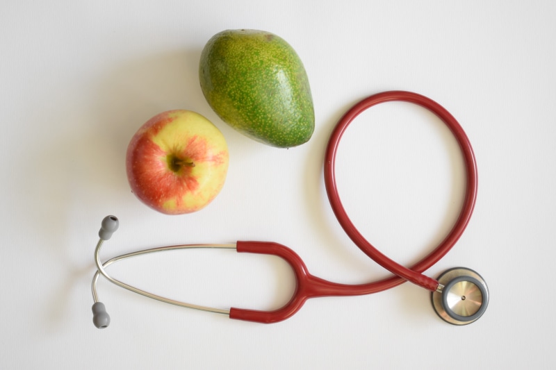medical equipment, directly above, illness, wellbeing, diet, apple - fruit, healthy eating, doctor, prevention, diabetes, obesity prevention, studio shot