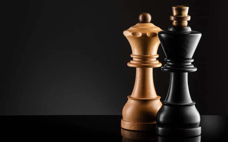 brown, copy space, studio shot, wood - material, game, relaxation, queen - chess piece, close-up, indoors, board game, black, no people, queen, leisure games