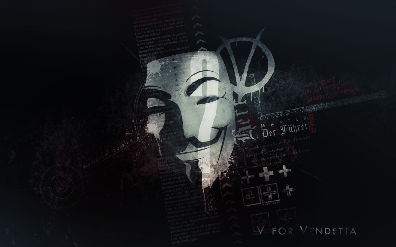 Anonymous, text, number, human representation, fawkes, wall - building feature, female likeness, built structure, representation, creativity, V for Vendetta