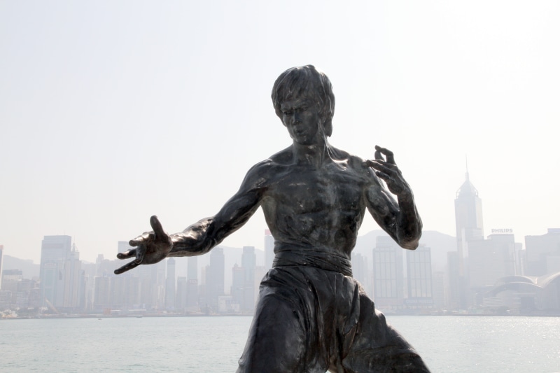 sky, cityscape, hong kong, statue, built structure, skyscraper, bruce, karate, creativity, chinese, day, travel destinations, master, landmark, female likeness