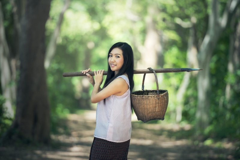 young women, beautiful woman, back, cambodia, farmer, beauty, lifestyles, holding, outdoor, focus on foreground, operator, looking at camera, one person