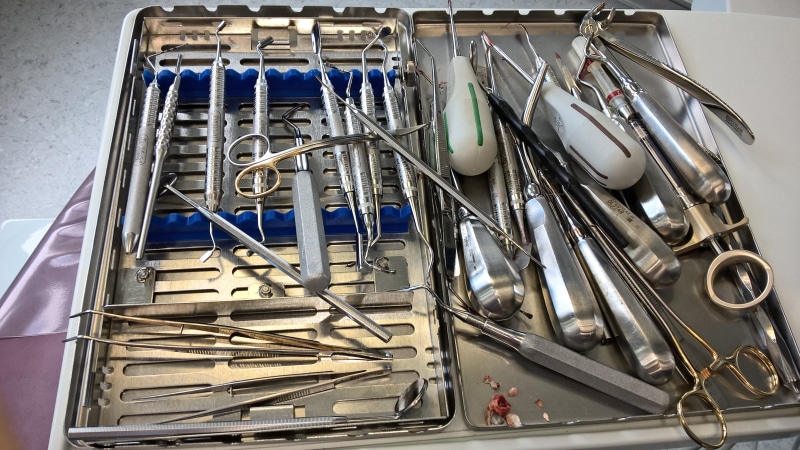 still life, high angle view, teeth, household equipment, kitchen utensil, no people, kit, order, domestic room, eating utensil, close-up, tooth, tool, silver colored