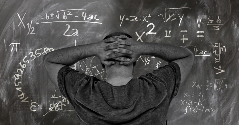 mathematics, volume integral, men, teacher, man, slate, human hand, human body part, school, mass moment of inertia, thinking, formula, chalk, adult, mass distribution