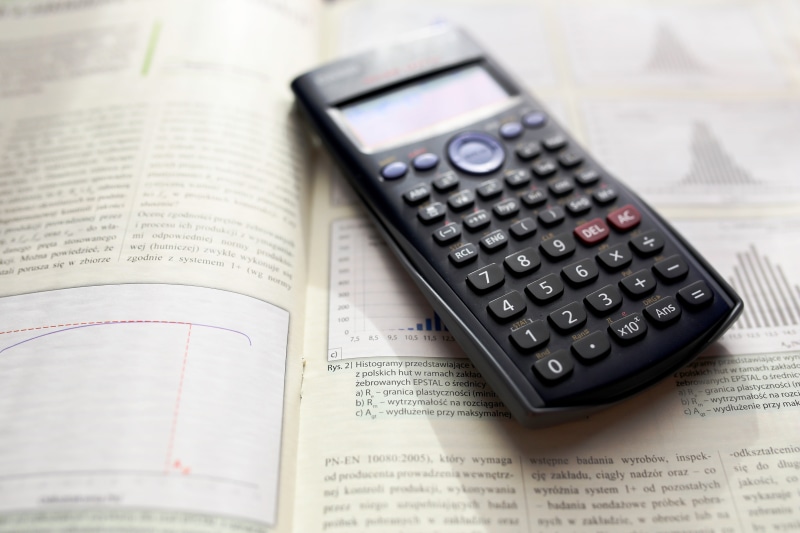 indoors, finance, stock market data, scientific, learning, no people, office, making money, business, algebra, book, number, investment, electronic, analyzing