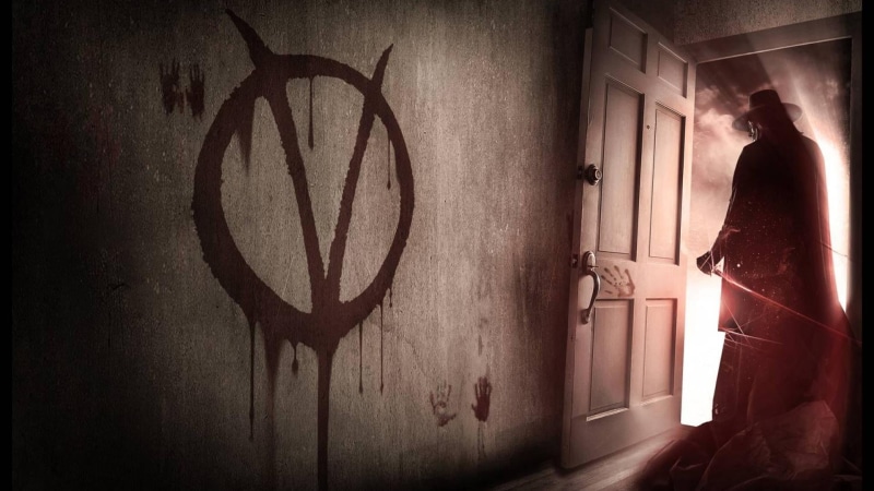 v, built structure, standing, artwork, one person, graffiti, indoors, V for Vendetta, three quarter length, door, entrance, wall - building feature, Guy Fawkes