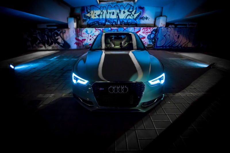 built structure, gray, racecar, indoors, pevement, headlight, illuminated, architecture, blue, car, automotive, lighting equipment, 5K, green, text, dark