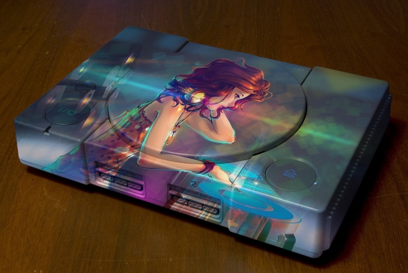 computer, communication, indoors, console, consoles, table, women, real people, one, 1080P, smart phone, multicolored, adult, high angle view, music, arts culture and entertainment