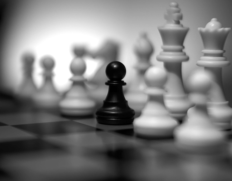 competition, rebels, leisure games, leisure activity, indoors, chess, arts culture and entertainment, king - chess piece, misfits, chess board, art, black and white
