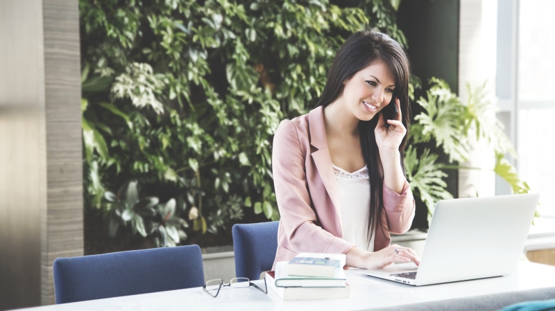 employee, corporate, female, smiling, wireless technology, connection, beige, executive, communication, wearing, adult, women, work, using laptop, desk