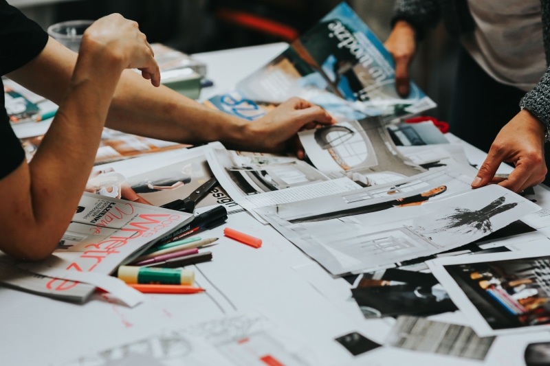 studio, men, human body part, indoors, occupation, table, real people, design, document, 5K, human hand, plan, photograph, work, holding, business, incidental people