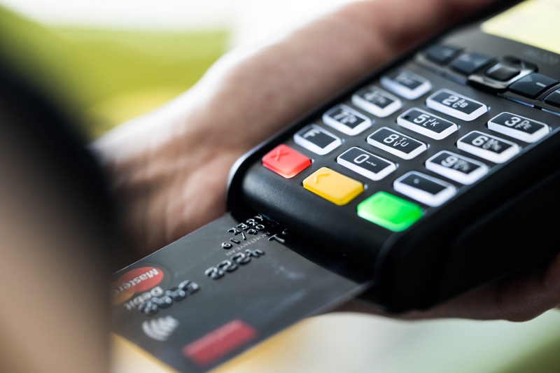 terminal, close-up, mid adult, entrepreneur, shopping, ecommerce, online, sales, paying, consumerism, debit cards, spending, credit card, finance, one person