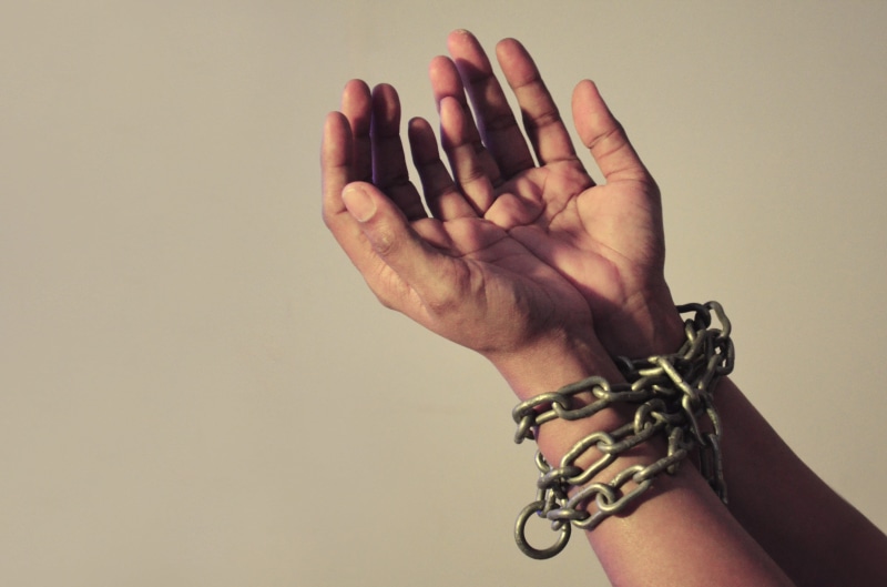 sadness, ideas, punishment, law, prison, chained, human hand, trapped, handcuffs, human limb, one person, arrest, social issues, studio shot, wrist, hand