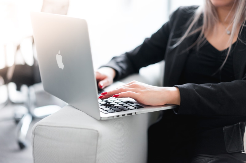 young adult, office space, one person, online, sofa, formal businesswear, top, laptop, agency, entrepreneur, macbook, ecommerce, women, furniture, people