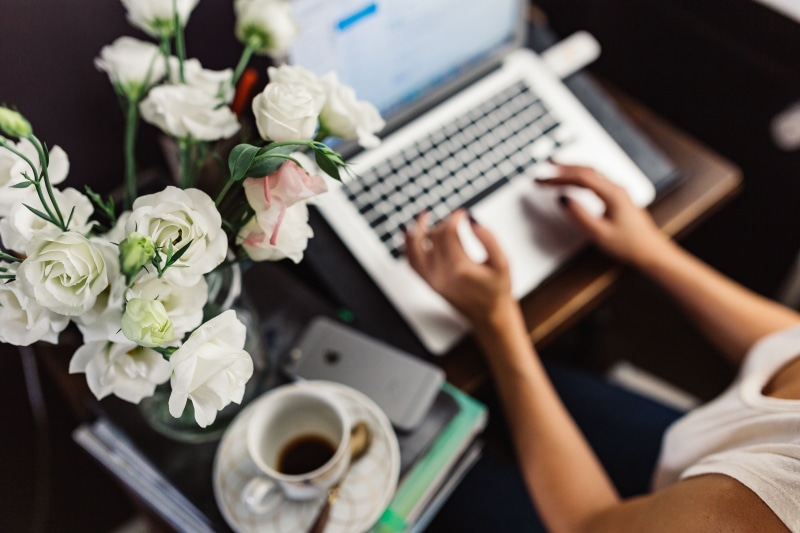 table, flower head, women, human Hand, work, flowering plant, one person, coffee cup, office, keyboard, businesswoman, workplace, flower, day, indoors