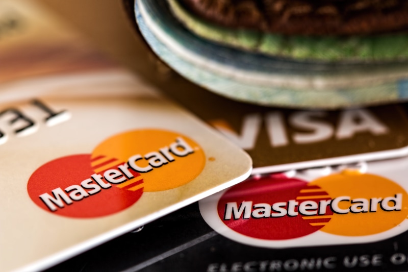 studio shot, purchase, communication, choice, shot, visa card, buy, close-up, paying, cash, money, business, indoors, credit card, commerce, finance, shopping