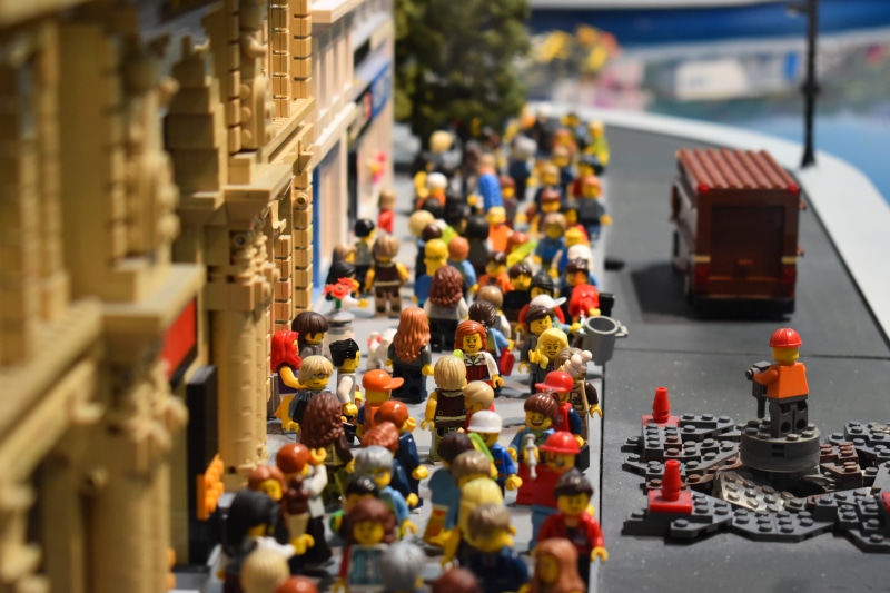 high angle view, street, selective focus, 5K, incidental people, creative, creativity, city, large group of objects, lot, transportation, person, lego piece