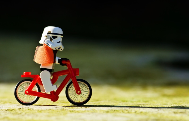 transportation, speed, mode of transportation, 2K, helmet, motion, one person, sports equipment, bicycle, sports helmet, red, day, Storm Troopers, childhood