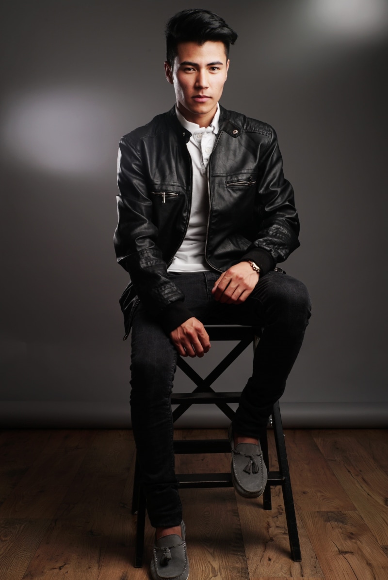 fine-looking, males, black, clothing, successful, leadership, boss, confident, chair, happy, sitting, social, wear, fashionable, stylish, stool, standing
