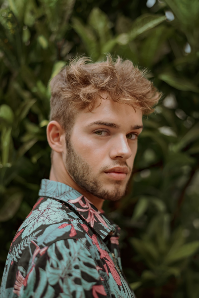blue, eyes, lifestyles, near, outdoors, plant, person, looking, fine-looking, focus, outerwear, blond hair, colors, fashionable, youth, contemplation, real people