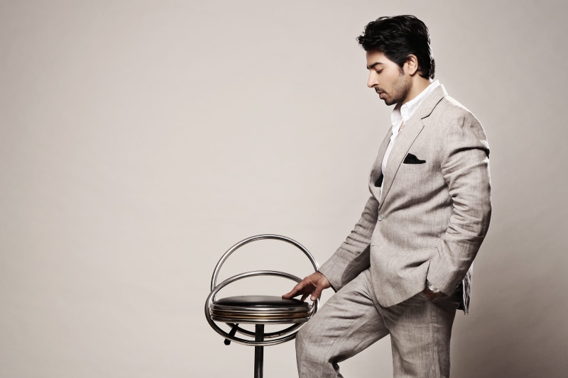 well-dressed, gray background, occupation, skill, holding, studio shot, clothing, businessman, copy space, side view, outfit, young men, suit, contemplation