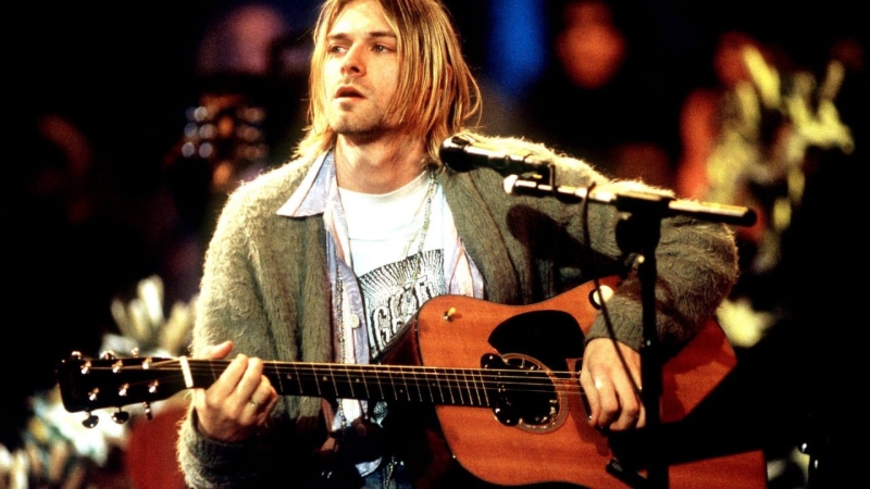 front view, string instrument, one person, cobain, real people, stage, plucking an instrument, popular music concert, Nirvana, performance, artist, guitar