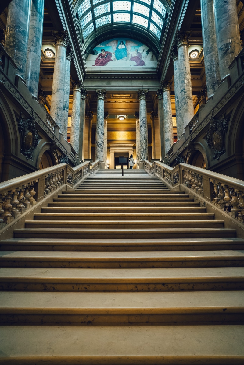 angle, pattern, built structure, indoors, illuminated, no people, low, columns, the way forward, direction, architectural column, transportation, pillars