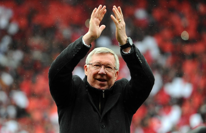 headshot, shouting, caucasian Ethnicity, smiling, cheerful, looking at camera, manchester united, front View, lifestyles, adult, outdoors, black, waist up