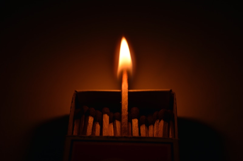 studio shot, special, flames, crowd, matchbox, stand out, individuality, different, indoors, success, leadership, heat - temperature, wood - material, follow