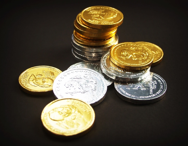 savings, surface, Tower, close-up, silver colored, graph, no people, rich, luxury, income, high angle view, success, object, up, round, black, currency