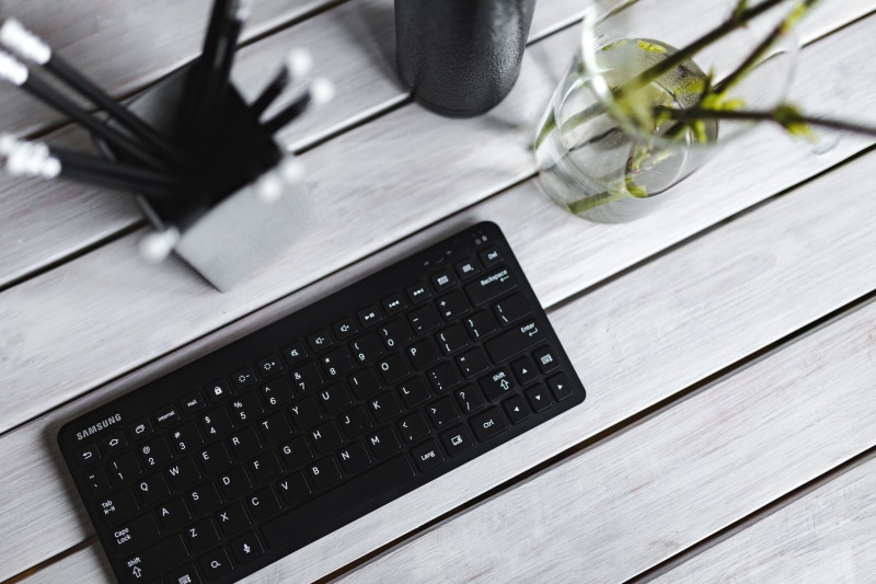 5K, computer equipment, communication, table, close-up, food and drink, desk, indoors, computer Keyboard, plant, office, wood - Material, laptop, wireless technology