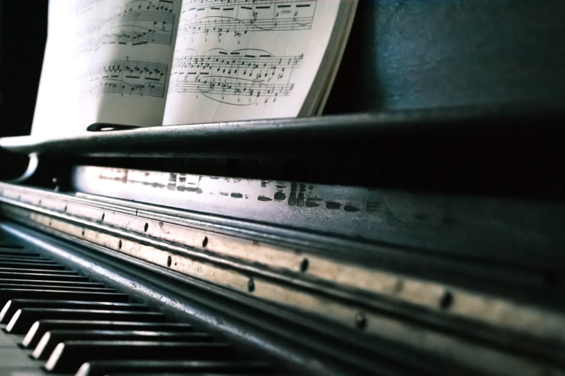 keyboard instrument, close-up, sheet music, paper, classical music, musical equipment, piano, background, musical instrument, still life, selective focus