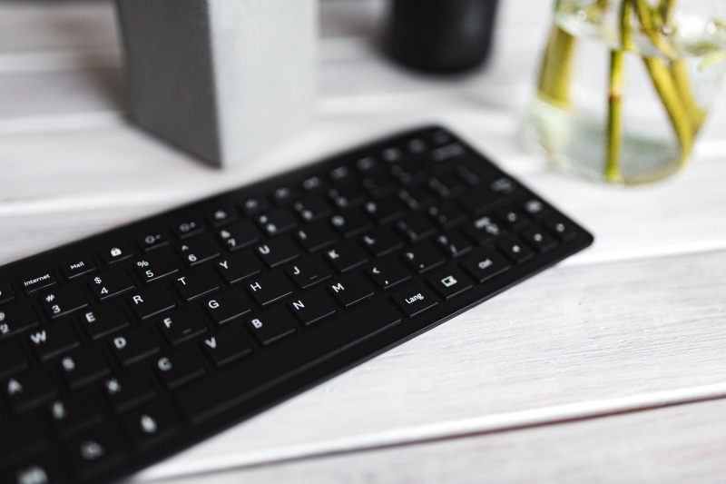 pencils, desk, computer, selective focus, computer equipment, still life, computer Keyboard, communication, indoors, white, table, pC, black, business