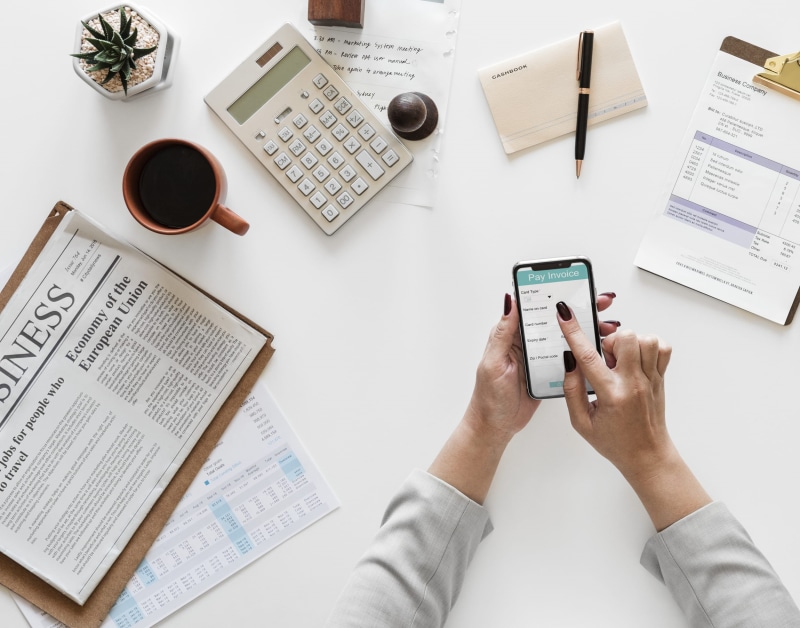 connection, working, 1080P, phone, drink, table, paper, hands, one person, coffee cup, person, digital device, technology, clipboard, wireless technology