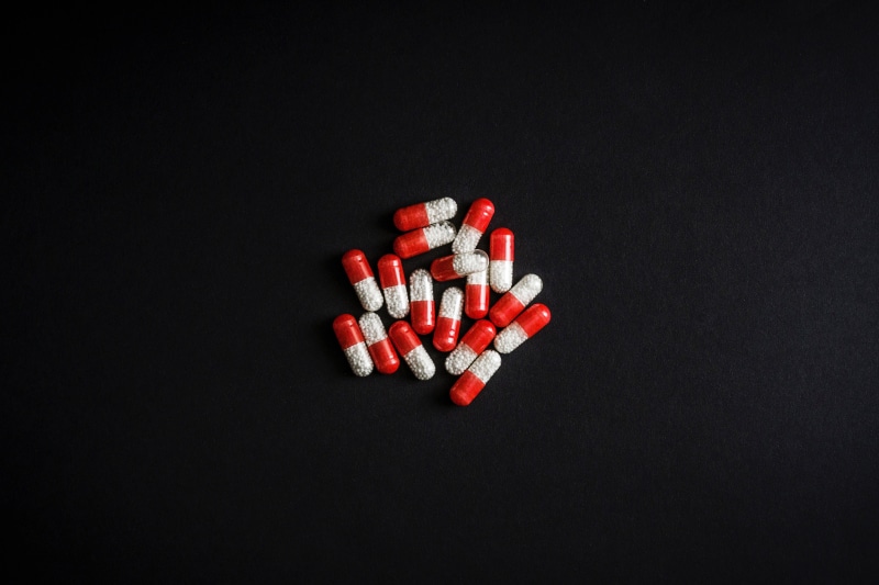 headache, pills, pain, vitamin, narcotic, black background, drug, drugs, nutritional Supplement, illness, still life, red, healthcare And Medicine, capsule
