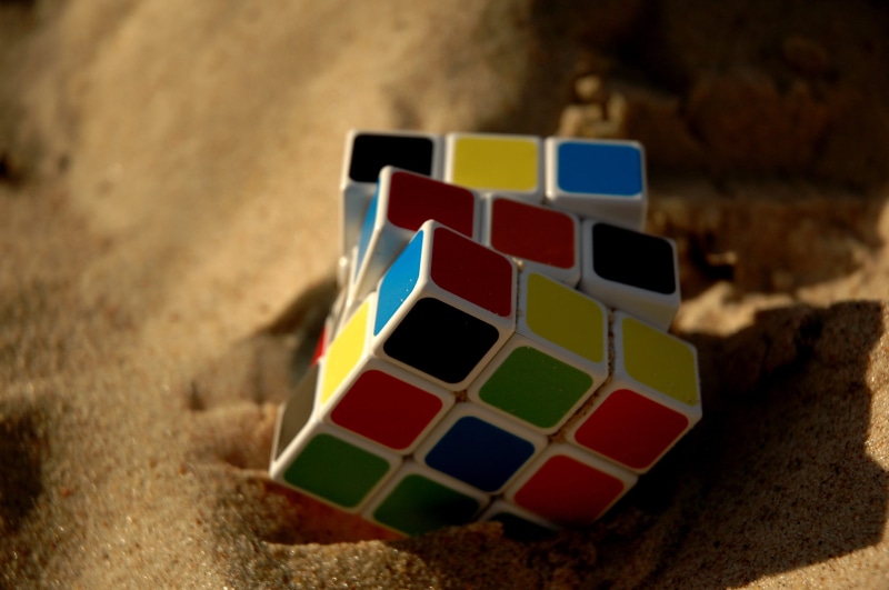 game, no people, colors, beach, solve, multi colored, rubik, intelligence, shape, challenge, indoors, selective focus, s, fun, leisure games, rubik cube