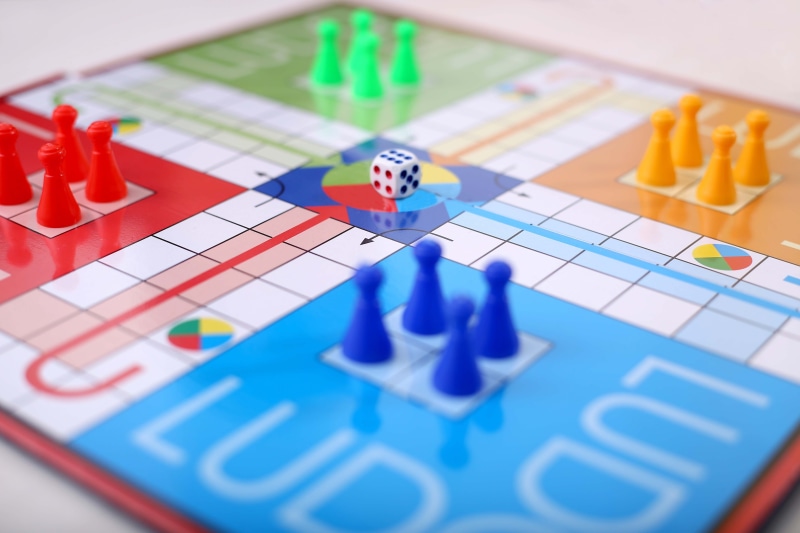 red, entertainment, relaxation, tokens, child, ludo, challenge, fun, leisure activity, play, still life, blue, dice, board, group, nature, education, green