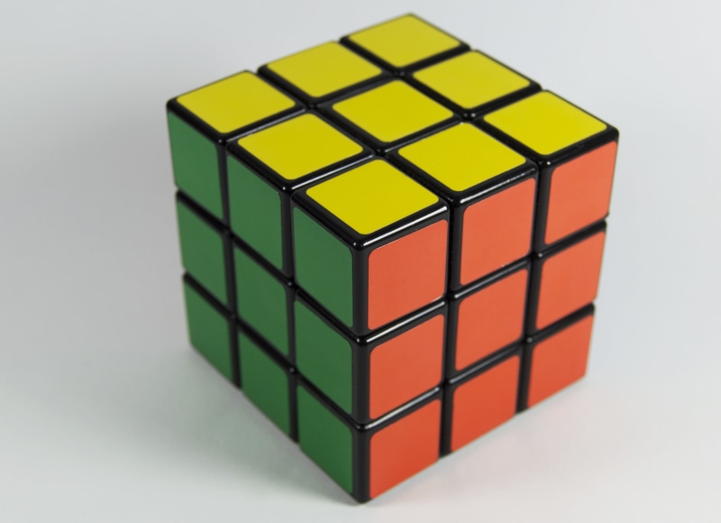 three dimensional, dimensional, leisure, mathematics, colorful, square, indoors, single object, cube shape, intelligence, gray, block, no people, group of objects