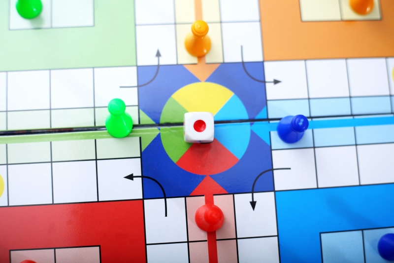 competition, fun, luck, numbers, indoors, pattern, ludo, close-up, business, challenge, yellow, full frame, chance, game, large group of objects, multi colored