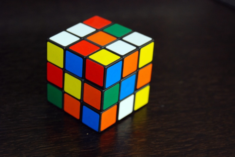 still life, toy block, studio shot, geometric shape, wood - material, block shape, block, black background, table, multi colored, solve, education, reflection
